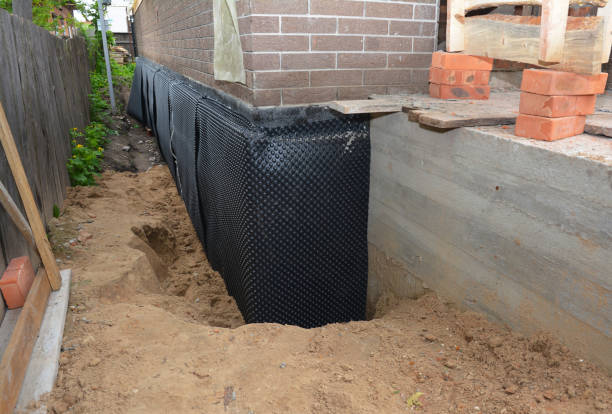 SJ Waterproofing Pros technician performing targeted Emergency Waterproofing assessment in Hamilton, VA